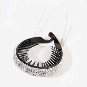 Sparkling crystal tassel hair clip for bun styling with rhinestone fringes on white background