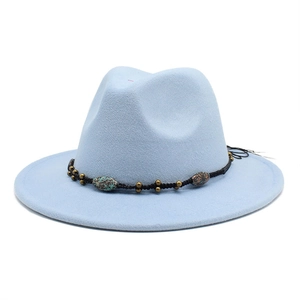 Detail of light blue wool fedora hat featuring a black braided band with ethnic beads