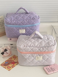 Quilted checkered makeup bags with dual zippers and handle in soft pastel aesthetic