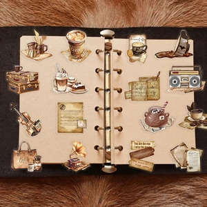 50pcs vintage coffee theme clear PET stickers pack shown on an open ring-bound notebook