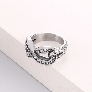Retro silver titanium steel ring with irregular snake scale pattern in a 45-degree view