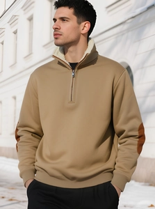 Detail of khaki quarter-zip sweatshirt with white fleece collar and contrast elbow patches
