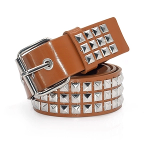 Detail of brown punk leather belt featuring silver square pyramid studs on white background