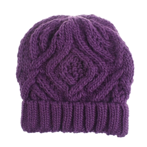 Detailed close-up of purple diamond-quilted knit pattern on a soft winter beanie hat