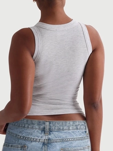 Detail of light grey ribbed knit tank top showing high-quality fabric and back fit