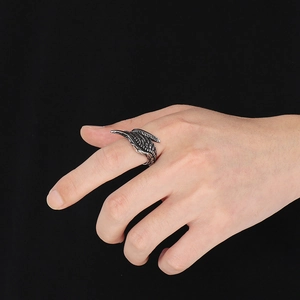 Vintage stainless steel guardian wing ring with detailed silver feather texture for men