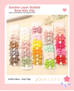 Colorful grosgrain double-layer bow hair clips displayed on white presentation cards