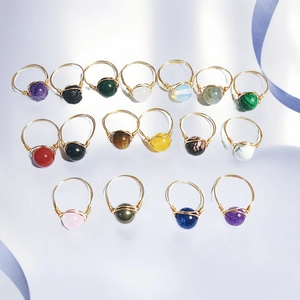 Handmade copper wire wrapped ring set with 17 assorted gemstone beads in various colors