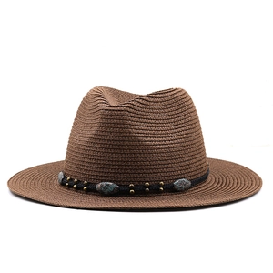 Detail of dark brown fedora straw hat with black woven band and turquoise stone beads