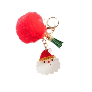 Christmas Santa Claus keychain with red pompom, green tassel, and gold metal keyring