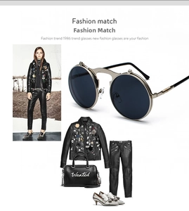 Detail view of steampunk flip-up sunglasses with round silver metal frames and dark lenses