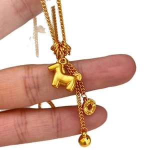 24K gold plated necklace with hollow copper coin and pony pendant on white background