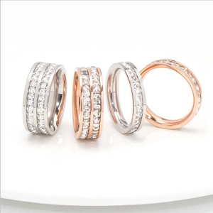 Polished titanium steel rings with rose gold and silver finish featuring cubic zirconia stones