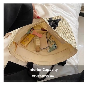 Top view detail of large beige woven tote bag interior showing spacious storage and inner pocket