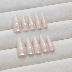 Pearlescent champagne gold handmade almond press-on nails with a mirror finish set