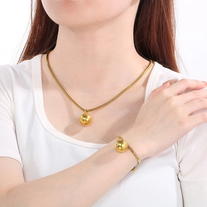 Elegant 18K gold plated jewelry set featuring hollow bead pendants on a snake chain