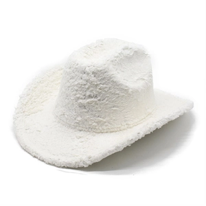 Detailed view of the plush white cowboy hat showing soft texture and wide brim curve