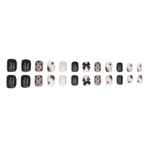 Black 3D bow and starry glitter gradient press-on nails set with 24 assorted pieces