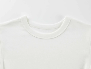 Close-up of the crew neck collar and knit texture on this white stretch modal sports t-shirt