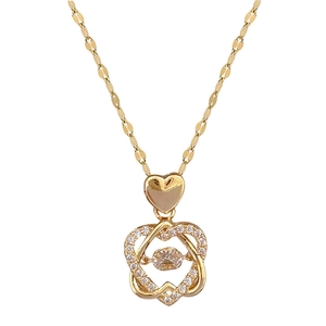 Luxurious double heart pendant necklace in gold with dancing stone and pavé crystals
