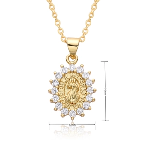 Detailed view of religious 18k gold plated pendant featuring 13mm by 16mm dimensions