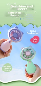 Dettaglio di mini ventilatori portatili con orecchie da orso e porta di ricarica USB