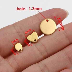 Golden stainless steel geometric charms in round heart and teardrop shapes for DIY jewelry