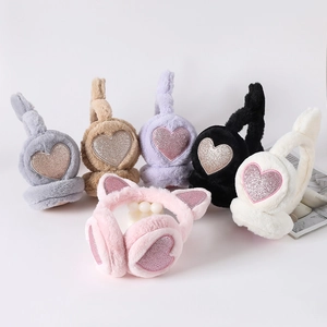 Detail of plush faux fur ear muffs with sparkling heart sequins in multiple colors