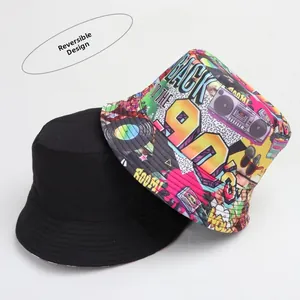 Reversible bucket hat showing solid black side and colorful 90s vintage graffiti print