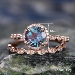 Rose gold wedding ring set with 10mm round stone and marquise diamond band
