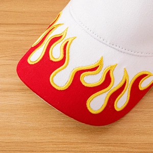 Close-up of high-quality flame embroidery on white cotton baseball cap visor