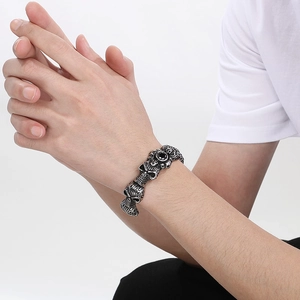 Gothic skull bangle with black zircon inlay in vintage stainless steel finish for men