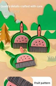 Detail of mini watermelon broom and dustpan set with creative fruit pattern and bristles