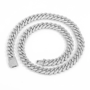 Icy 10mm S925 silver moissanite Cuban link chain with paved stones on white background