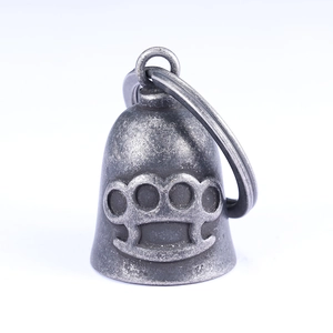 Punk style motorcycle bell pendant with knuckle duster relief in antique silver finish