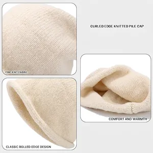Chic cream white knitted beanie with rolled edge design for a cozy autumn winter look