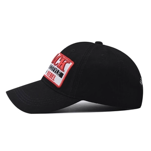 Detail of black cotton baseball cap with embroidered CK STYLE REBEL patch and stitched brim