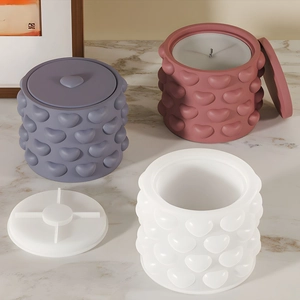 Detailed view of heart-textured silicone molds for DIY storage cups and resin containers