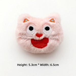 Close-up of pink plush cartoon cat badge with detailed embroidery, size 5.3cm x 6.5cm