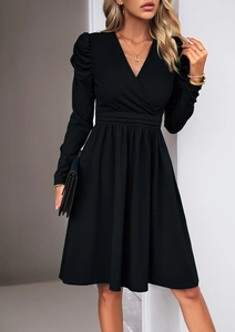 Detail of elegant black V-neck dress with long sleeves and pleated waistline design