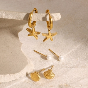 Parure de boucles d'oreilles thème océan avec étoiles de mer, perles et coquillages