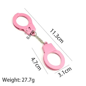 Pink mini handcuff keychain toy in matte finish with a total length of 11.3cm