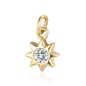 Close-up of gold eight-pointed star pendant with sparkling round cubic zirconia