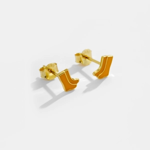 Macro detail of cute orange enamel boot earrings with S925 sterling silver hallmarked back