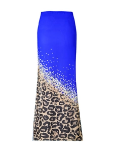 Detail of leopard print mesh skirt with blue bodice and sparkling gold sequin gradient