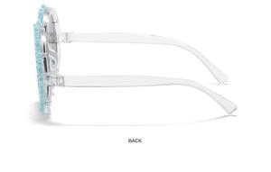 Side view of light blue daisy flower sunglasses with transparent frames for kids