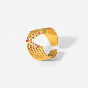 Detailed 10.55mm width view of 18K gold plated multi-layer ring with colorful enamel dots
