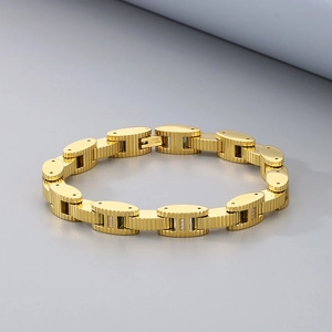 Detail view of gold stainless steel watch-style bracelet with H-link design and zircons