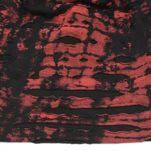 Distressed tie-dye beanie hat in red and black with breathable knit punk style texture