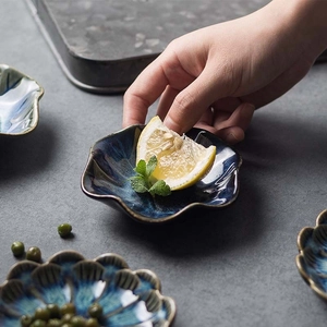 Retro kiln glazed ceramic petal plates with gold edges and blue texture for condiments